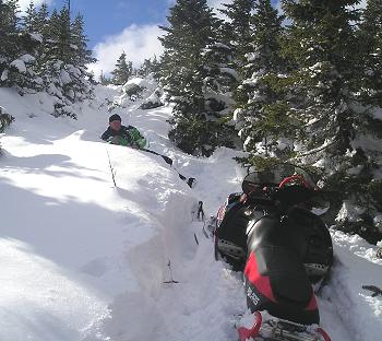 Off-trail snowmobiling in Kokadjo